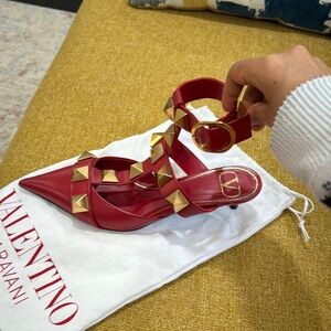Valentino Garavani Red Heels with Stiletto Design and Intricate Straps